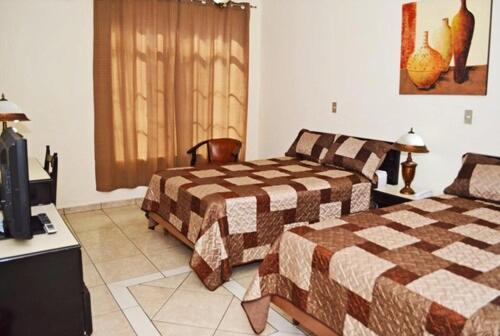 Hotel Tropico Inn San Miguel Buitenkant foto