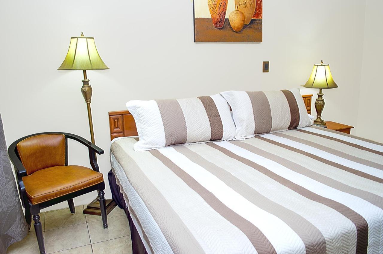 Hotel Tropico Inn San Miguel Buitenkant foto